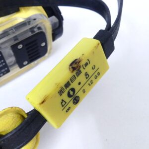 MINOLTA WEATHERMATIC Aのストラップ部にある距離目盛り表示のアップ